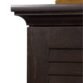 Close-up of Napoli Shutter Wardrobe in Antiqued Paint showing crown molding and corner detail