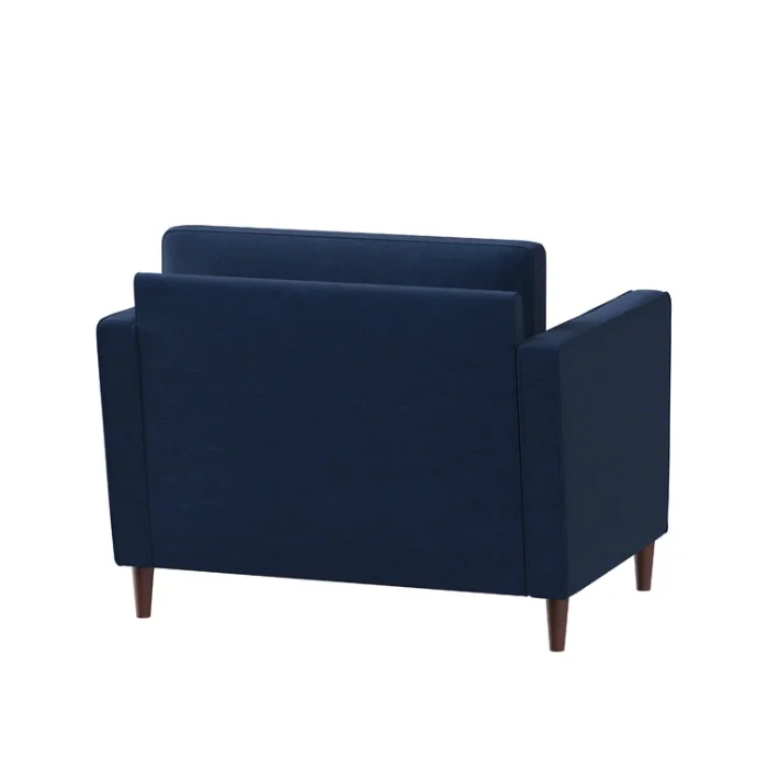 Rear angled view of Atlas Sofa Chair in Navy Blue Linen with wooden legs, highlighting its sturdy frame and elegant design