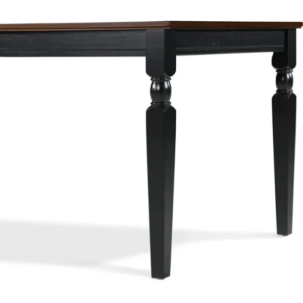 Lancaster 60-inch dining table with solid wood construction, black base, and classic turned legs. Lancaster 60-inch dining table with solid wood construction, black base, and classic turned legs.