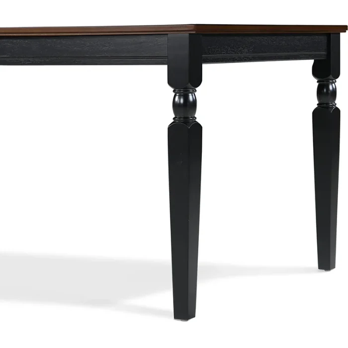 Lancaster 60-inch dining table with solid wood construction, black base, and classic turned legs.