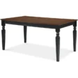 Lancaster 60-inch rectangular dining table with solid wood top, black base, and turned legs.