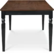 Lancaster 60-inch dining table with a rich brown wooden top, black solid wood base, and elegant turned legs.