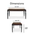 Lancaster 60-inch dining table dimensions: 60 inches width, 36 inches depth, and 29.75 inches height, featuring a brown wood top and black base.