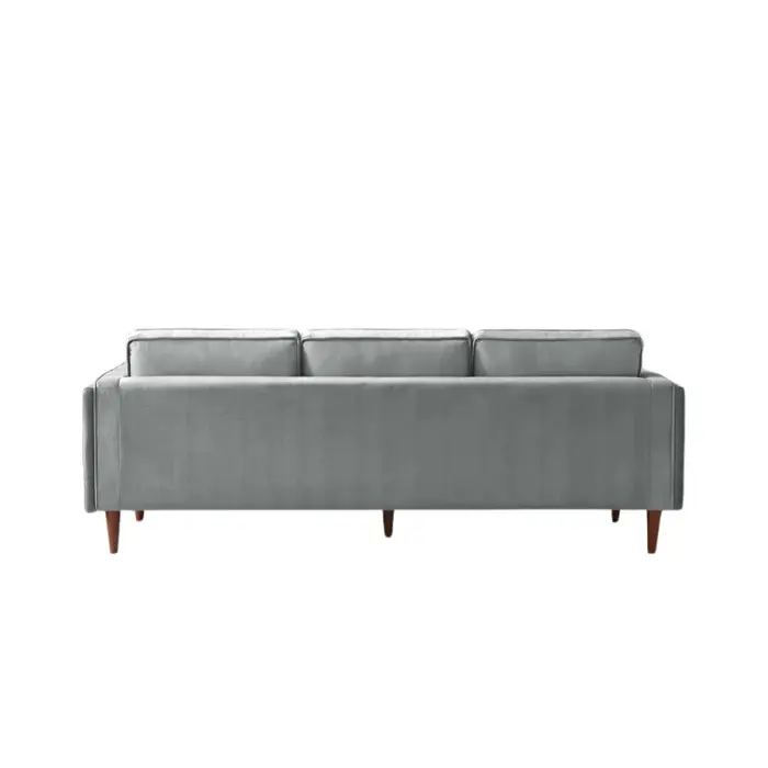 Monarc Sofa back view with velvet upholstery and wooden legs.