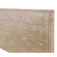 Close-up of the headboard of a single bed with barnwood finish, showcasing the textured slats and rustic details of the wood