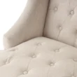 Close-up of Cambridge Wingback Chair - Beige, Tufted Upholstery with Button Detailing, Soft Fabric Texture