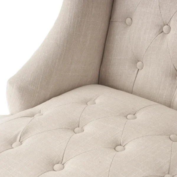 Cambridge Wingback Chair Beige 3 Close-up of Cambridge Wingback Chair - Beige, Tufted Upholstery with Button Detailing, Soft Fabric Texture