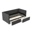 Gray Nestora Daybed with wooden slats and two pull-out storage drawers, showcasing its sturdy and functional design.