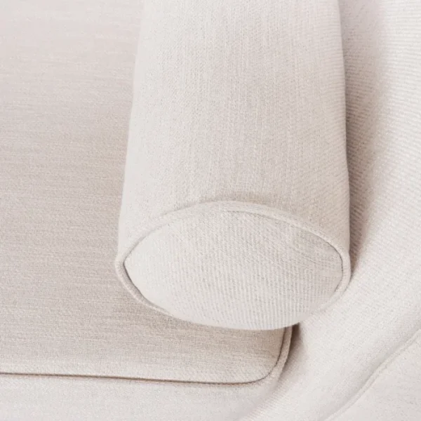 Close-up of Velancia Chaise Sofa Beige Bolster Pillow and Soft Upholstery Close-up of Velancia Chaise Sofa Beige Bolster Pillow and Soft Upholstery