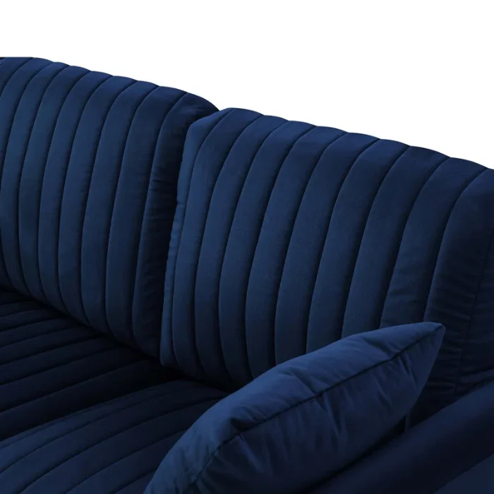 Close-up of Aurello Velvet Chair’s tufted backrest and cushion in navy blue velvet.