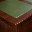 Conte Executive Desk wide view showing full tabletop with three green leather writing panels