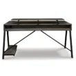 Roco Elite Gaming Desk featuring a sleek design with a raised shelf for extra storage and a sturdy metal frame.