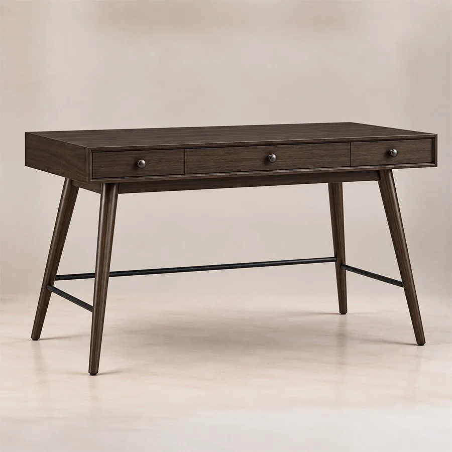 script-trestle-writing-desk-walnut-angle-view. Angled front view of Script Trestle Writing Desk in Walnut finish with three-drawer storage