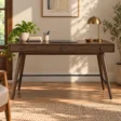 Script Trestle Writing Desk in Walnut finish styled in a warm home office interior