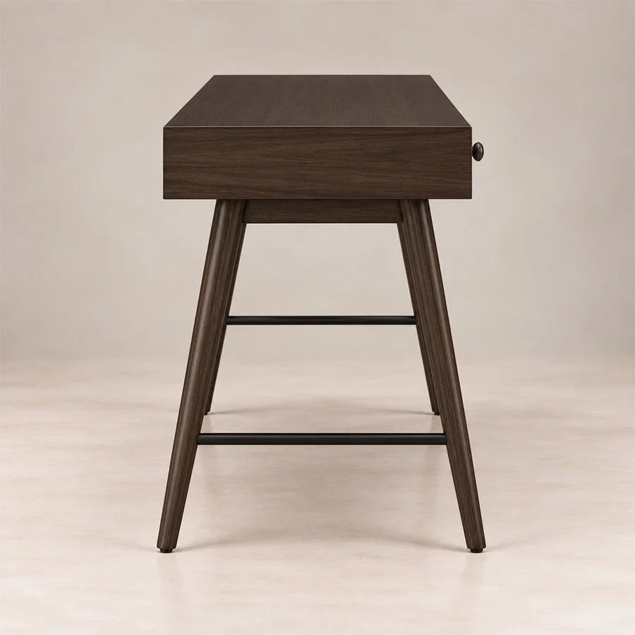 script-trestle-writing-desk-walnut-side-view. Side view of Script Trestle Writing Desk in Walnut finish showing the wooden trestle leg structure