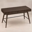 Elevated angle view of Script Trestle Writing Desk in Walnut finish showing the spacious work surface