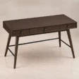 Elevated angle view of Script Trestle Writing Desk in Walnut finish showing the spacious work surface
