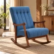 Blue Aristo Rocking Chair styled in a warm living room with wooden arms and curved rocker base