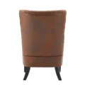 Back view of Crown upholstered wingback chair in brown faux leather with nailhead trim