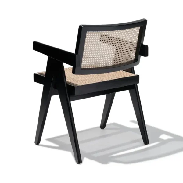 Chaya Cane Armchair in Black with woven cane backrest and seat, rear view Chaya Cane Armchair in Black with woven cane backrest and seat, rear view