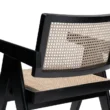 Chaya Cane Armchair close-up of woven cane backrest and seat with black wooden frame