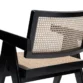 Chaya Cane Armchair close-up of woven cane backrest and seat with black wooden frame