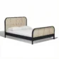 Angled view of cane bed in a white background