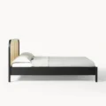 Side profile view black cane bed