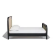 side view of cane bed in a white background.