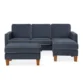 Side view of Harbor Sectional Sofa in navy blue fabric with contrast piping and wooden legs.