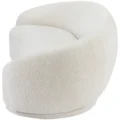 Close-up of the Opulence Bouclé Chesterfield Sofa in white fabric, showcasing the soft, plush, and curved design