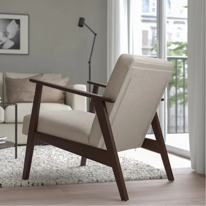 Roco Harbor Armchair – Wooden lounge chair with cushioned seat and backrest, ideal for home and office use.
