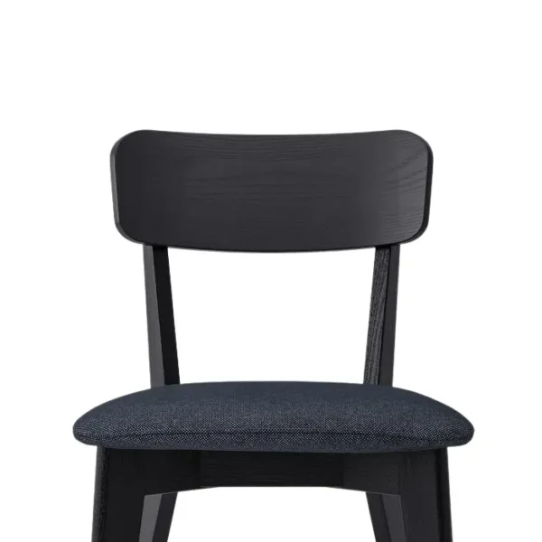 Roco Lisette Dining Set 3 Close-up of Roco Lisette dining chair with curved black backrest and cushioned dark fabric seat.
