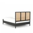 angled back view of cane bed showing headboard back
