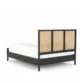 angled back view of cane bed showing headboard back