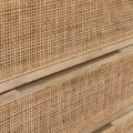 Close-up of woven cane drawers on Celesté Dresser with natural wood finish