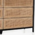 Lower drawers of Celesté Cane Dresser featuring woven rattan fronts and wood frame