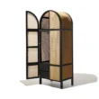Cicada Cane Wardrobe with black wood frame, natural cane panels, and arched doors
