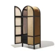 Cicada Cane Wardrobe with black wood frame, natural cane panels, and arched doors