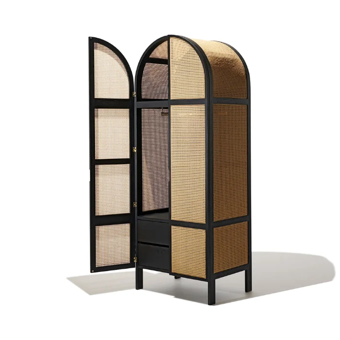 Cicada Cane Wardrobe with black wood frame, natural cane panels, and arched doors