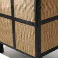 Cicada Cane Wardrobe with intricate woven cane panels and a sturdy black wood frame