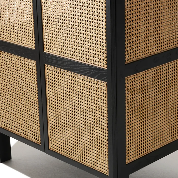 Cicada Cane Wardrobe with intricate woven cane panels and a sturdy black wood frame