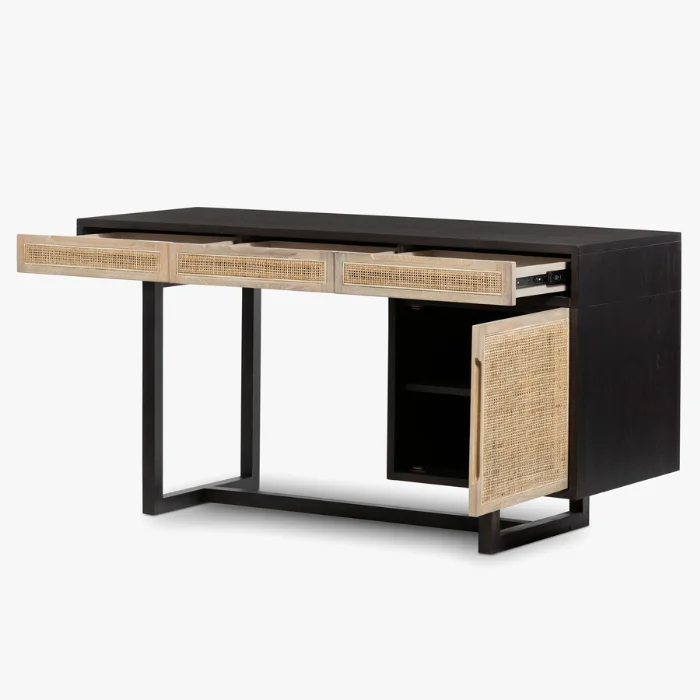 Delilah Cane Desk with open drawers and cabinet, featuring a black wood frame and cane panels