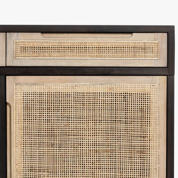 Close-up of Delilah Cane Desk with natural cane panels and dark wood frame Close-up of Delilah Cane Desk with natural cane panels and dark wood frame