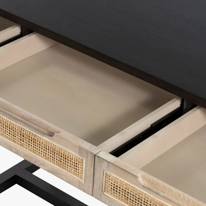 Open drawers of Delilah Cane Desk showcasing smooth sliding mechanism and natural cane detailing