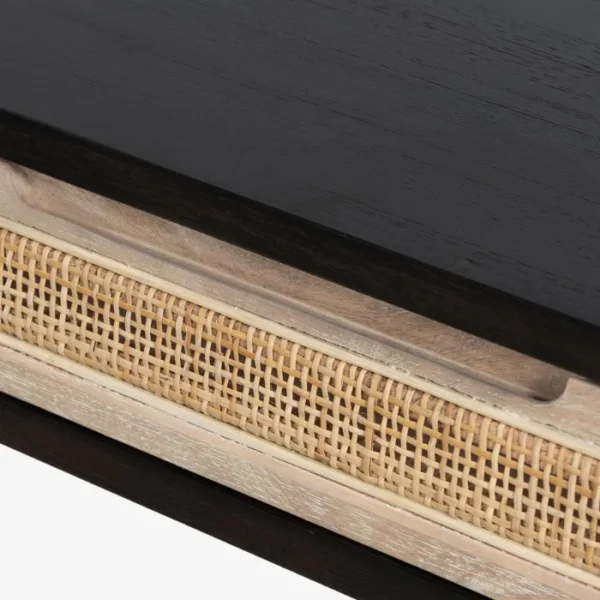 Close-up of Delilah Cane Desk drawer with woven cane panel and black wood top Close-up of Delilah Cane Desk drawer with woven cane panel and black wood top
