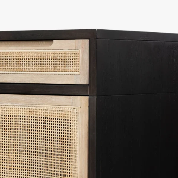 Close-up of Delilah Cane Desk featuring black wood finish and natural woven cane drawer panel Close-up of Delilah Cane Desk featuring black wood finish and natural woven cane drawer panel