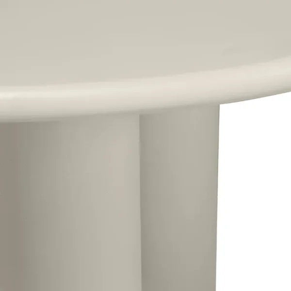 Close-up view of Fascia Round Dining Table with a smooth wooden surface and sturdy cylindrical base Close-up view of Fascia Round Dining Table with a smooth wooden surface and sturdy cylindrical base