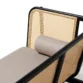 Side view of black cane sofa with handwoven rattan panels, beige cushion, and a solid wood frame