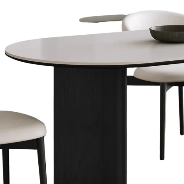 Orbis Dining Set 3 Close-up of Orbis Dining Table with Matte Cream Top and Black Base